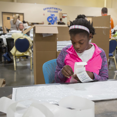 person sorting items in a job skill training center.