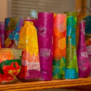 glass vases decorated with colorful decoupaged tissue paper